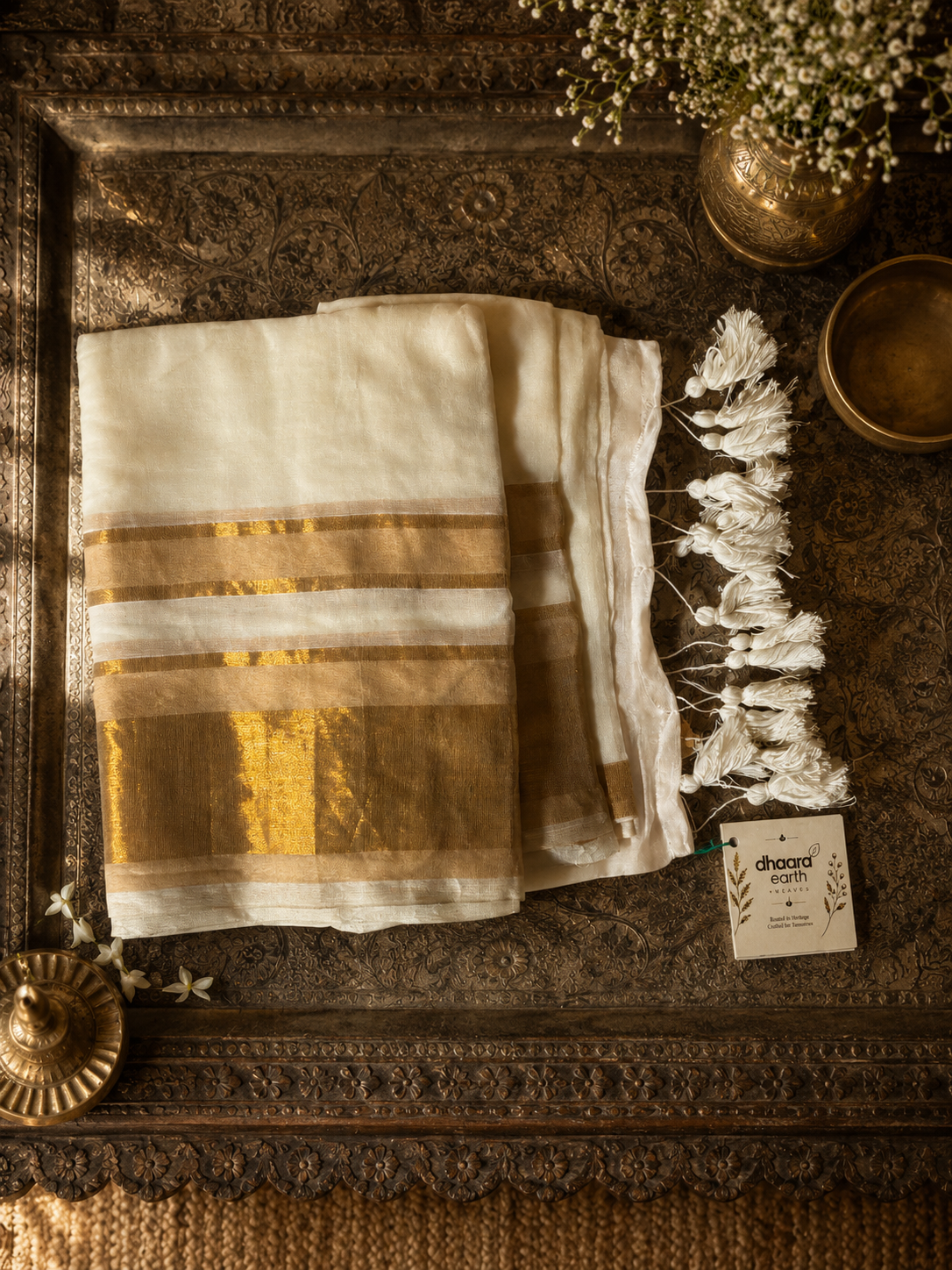 Off white mul cotton saree with golden zari