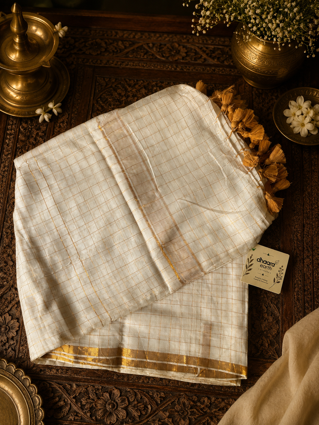 Off white mul cotton saree with golden zari checks and small border