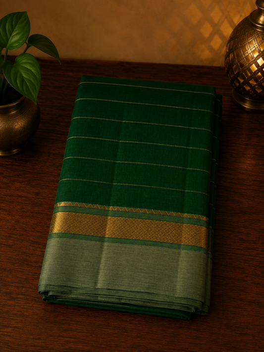 Bottle green handwoven cotton saree with sage green and golden zari border and stripes