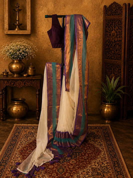 Off white mul cotton saree with purple, green and golden zari border